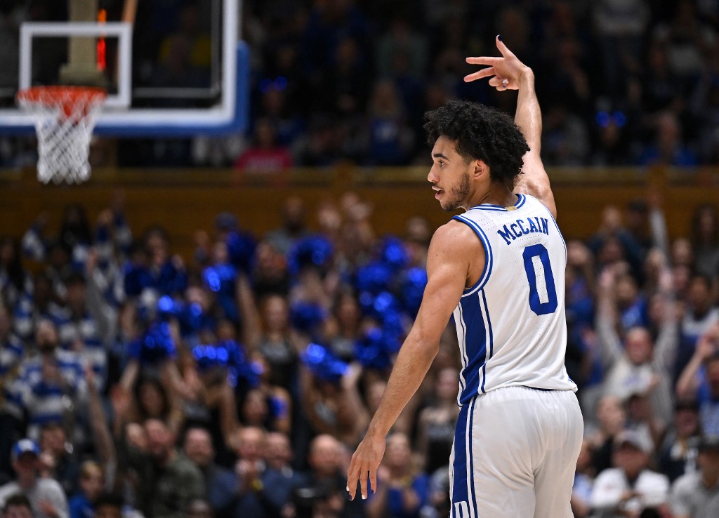 Jared McCain of the Duke Blue Devils reacts after making a 3-point basket against the Wake Forest Demon Deacons, and we offer our best BetMGM bonus code to North Carolina bettors.