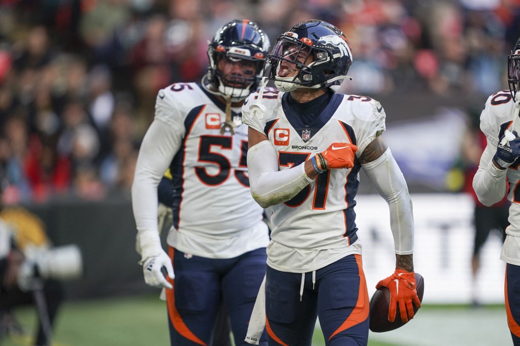 Justin Simmons of the Denver Broncos celebrates his interception against the Jacksonville Jaguars. 