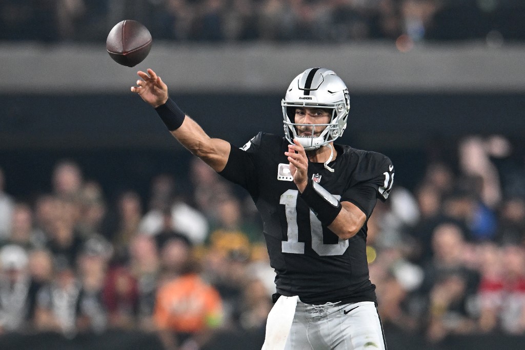 Jimmy Garoppolo #10 of the Las Vegas Raiders throws the ball as we look at our Patriots-Raiders predictions.