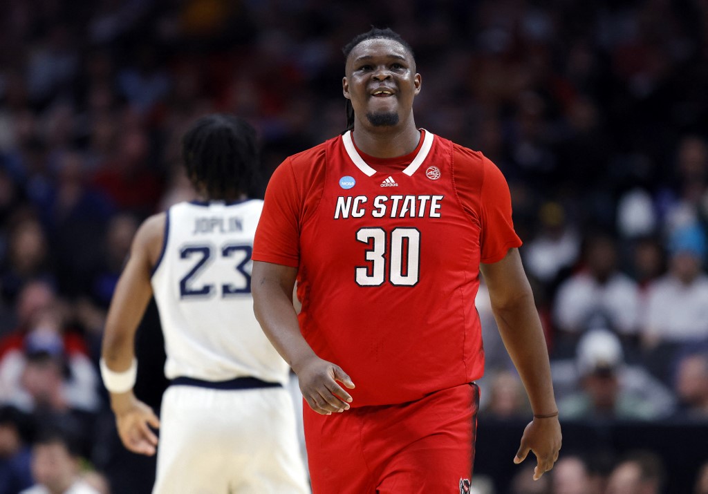 DJ Burns Jr. #30 of the North Carolina State Wolfpack reacts as we offer our best NC State vs. Purdue player props for the Final Four on Saturday.