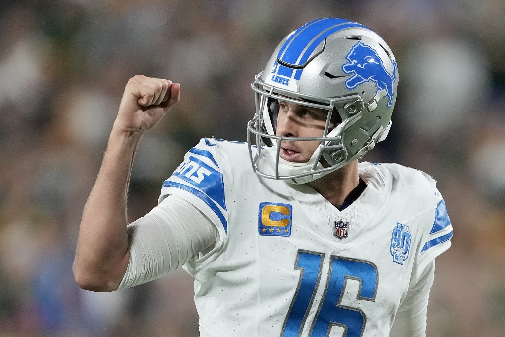 Jared Goff of the Detroit Lions celebrates after David Montgomery scores a touchdown against the Green Bay Packers, and we offer our top Broncos vs. Lions predictions based on the best NFL odds.