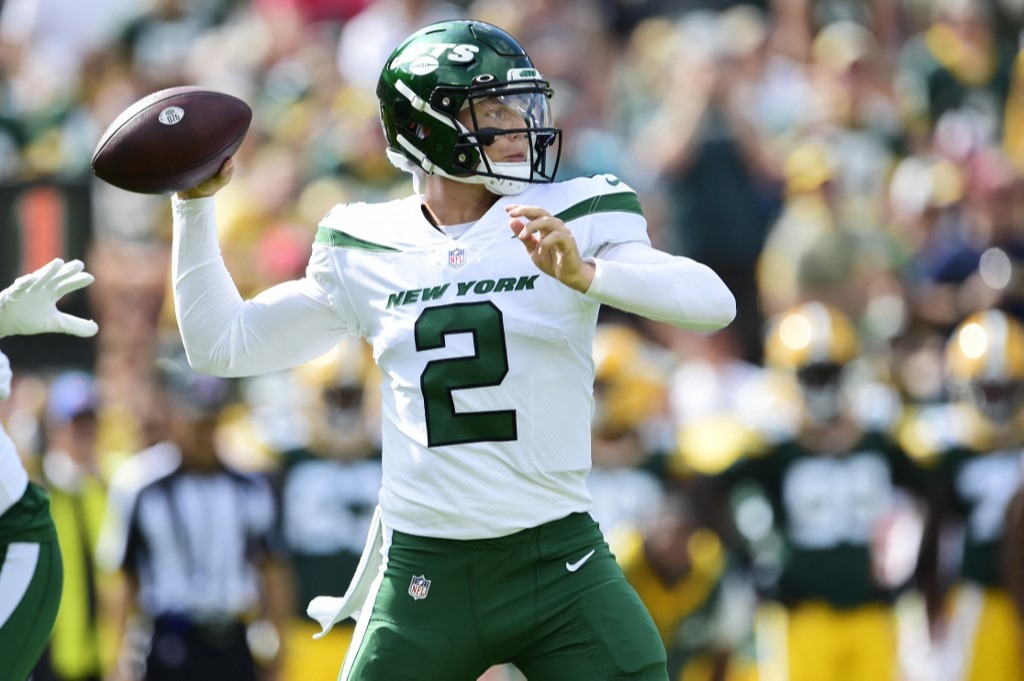Zach Wilson #2 of the New York Jets throws a pass against the Green Bay Packers in the first half of a NFL preseason game at Lambeau Field on Aug. 21, 2021.