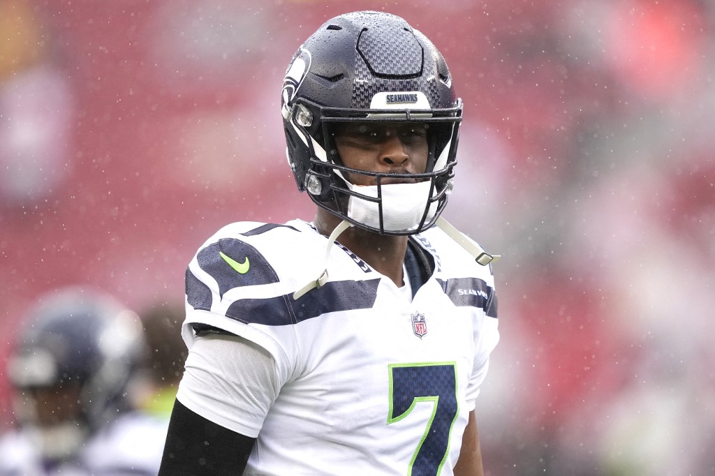 Geno Smith of the Seattle Seahawks looks on prior to the NFC Wild Card playoff game against the San Francisco 49ers as we look at our Seahawks betting preview.