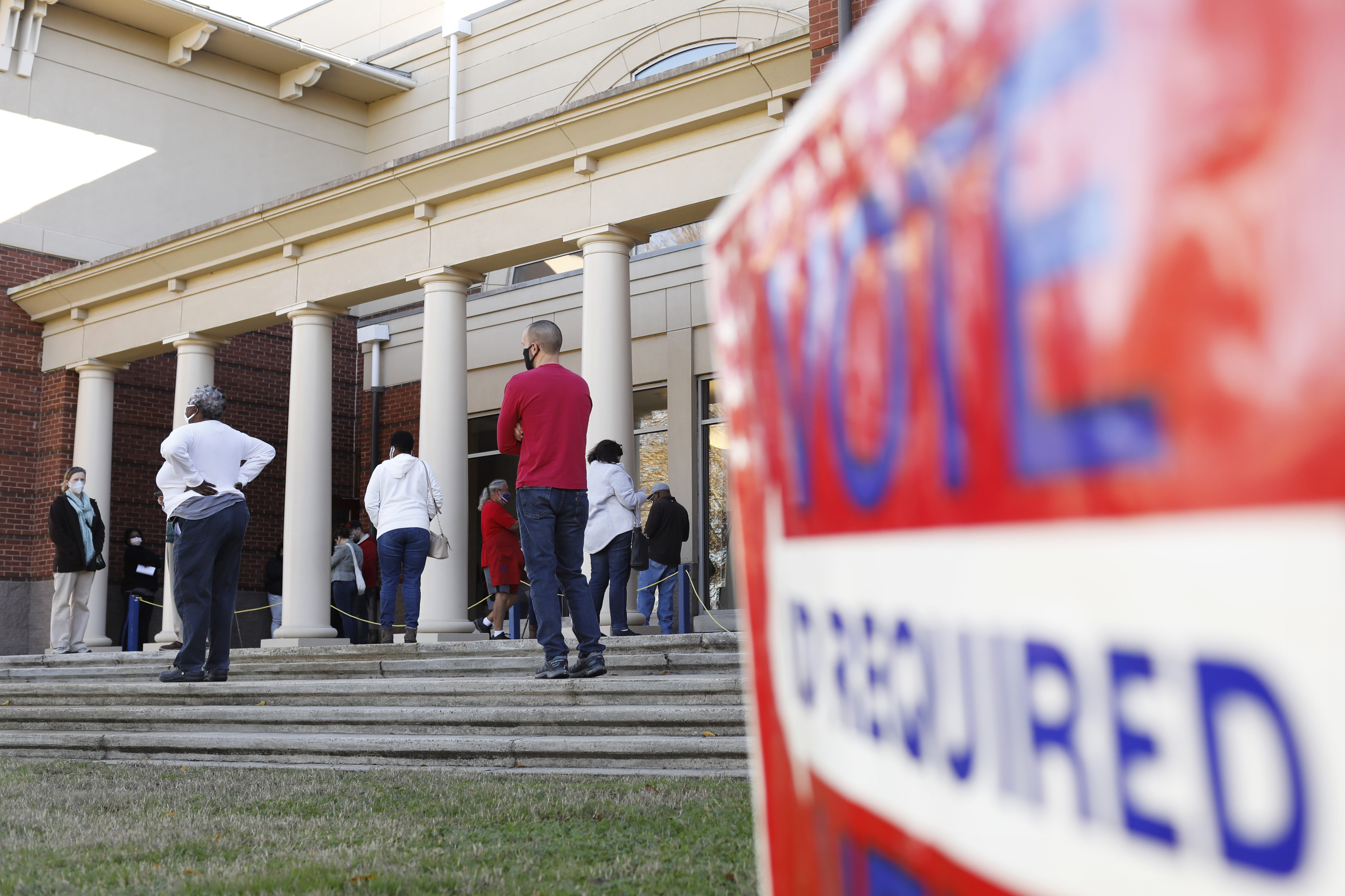 Dec 14, 2020; Athens, GA, USA; Voters line up on the first day of early voting for Georgia