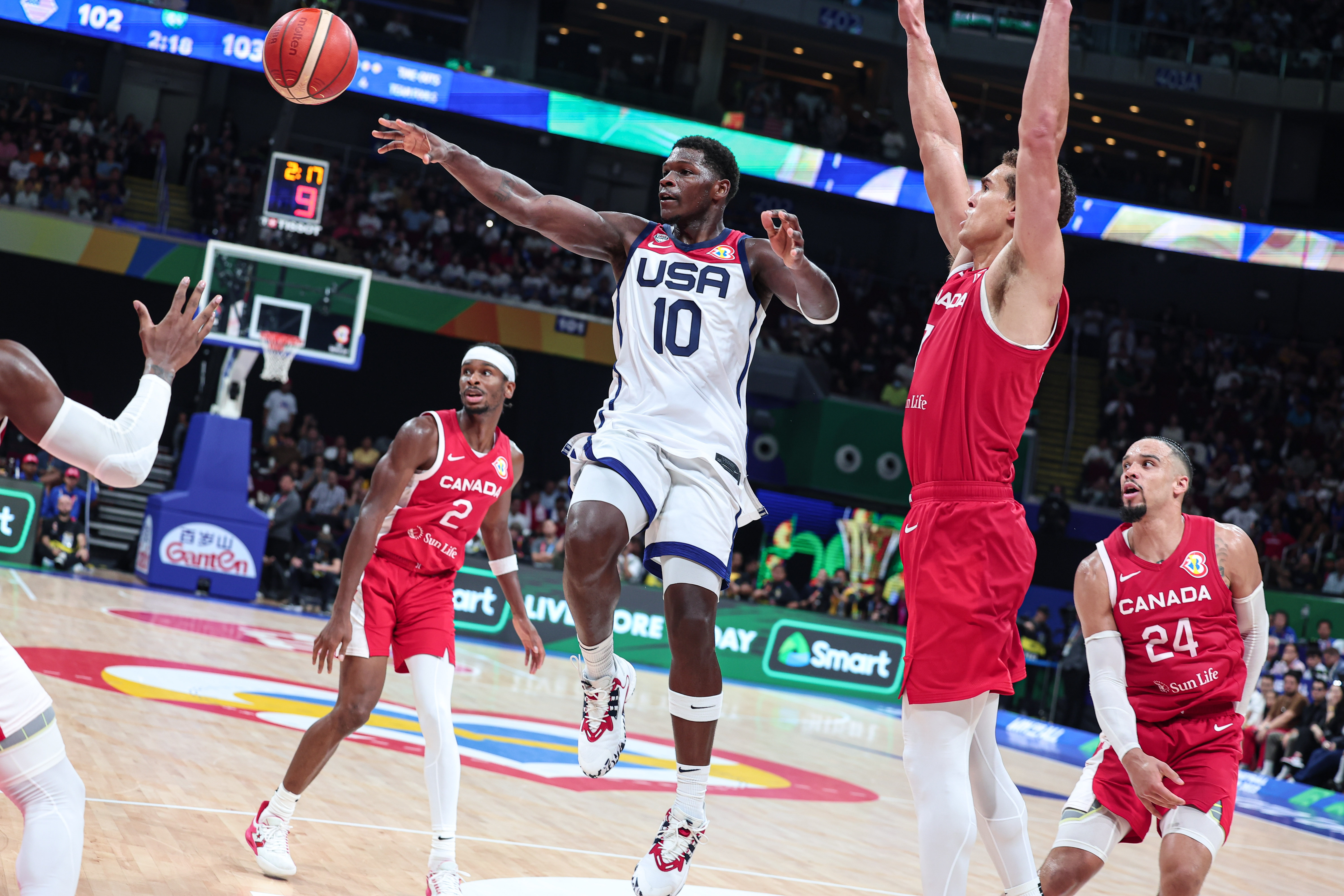 Anthony Edwards (2nd L) of the United States passes the ball as we examine the latest men's Olympic basketball tournament odds.