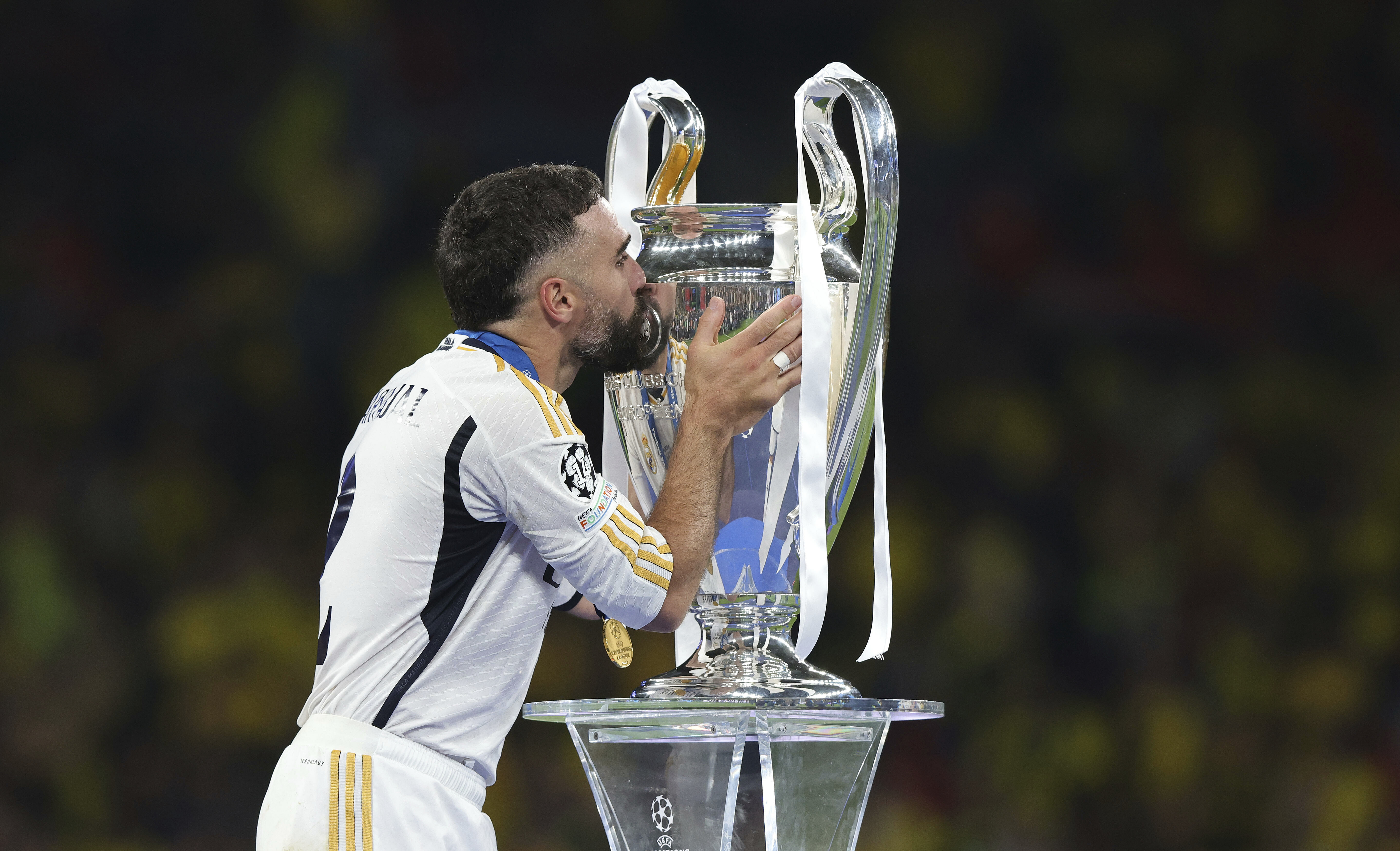 Dani Carvajal of Real Madrid kisses the Champions League trophy as we look at the best 2024-25 Champions League odds.