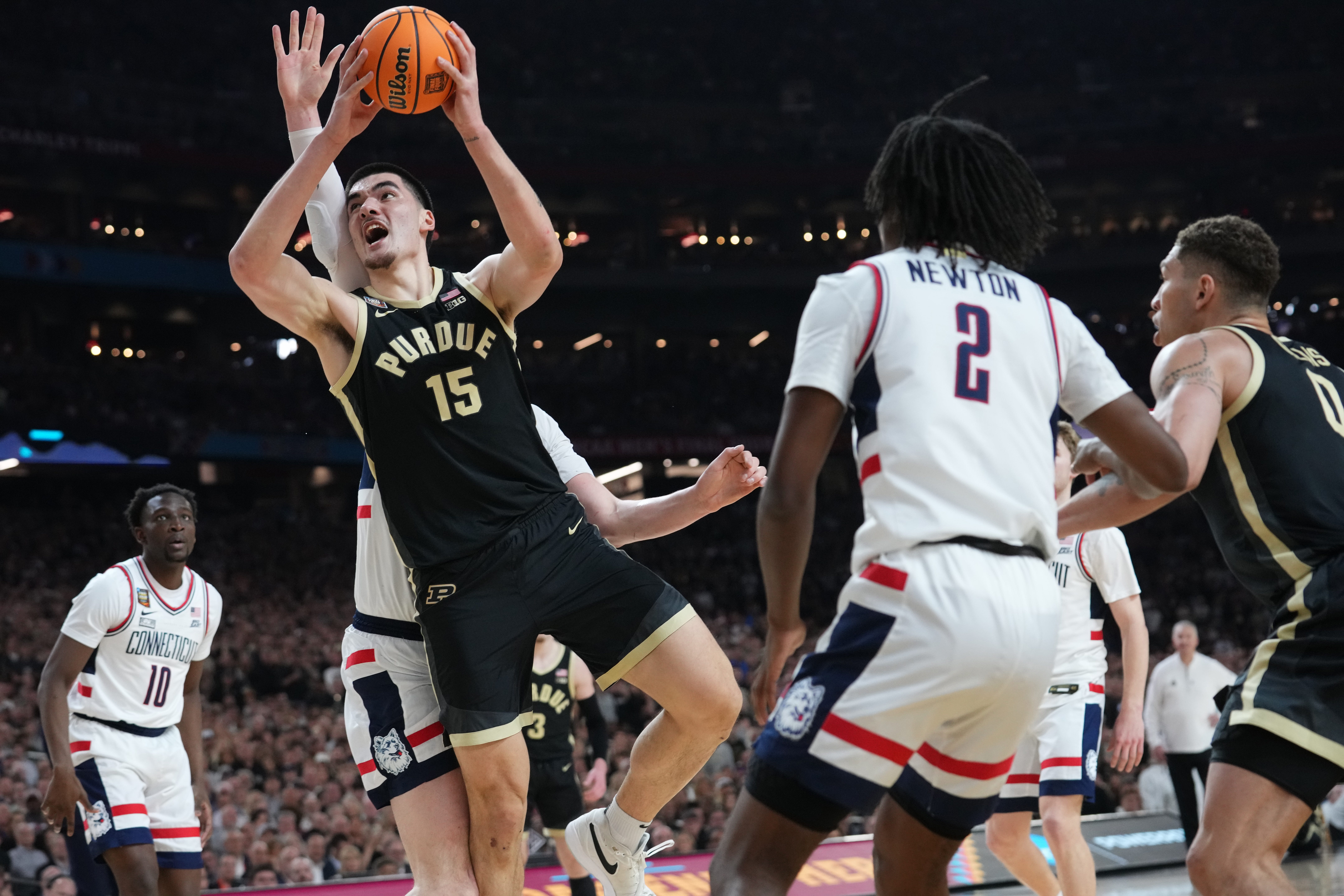 Purdue Boilermakers center Zach Edey attempts a shot during the men's NCAA national championship game against the UConn Huskies. We're backing Edey in our NBA Draft Player Props.
