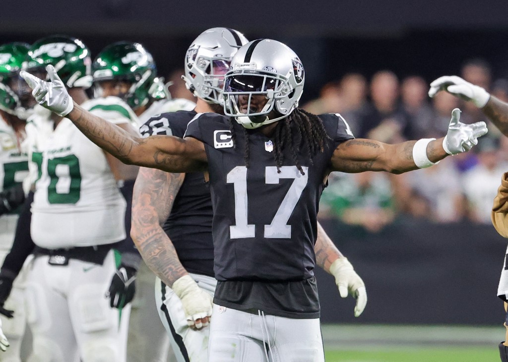 Wide receiver Davante Adams of the Las Vegas Raiders gestures to fans as we look at Nevada's sports betting report for December.