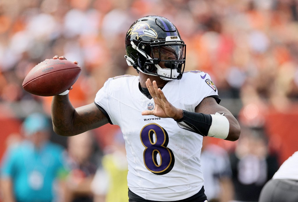 Lamar Jackson of the Baltimore Ravens passes against the Cincinnati Bengals as we share our favorite Lamar Jackson player prop picks.