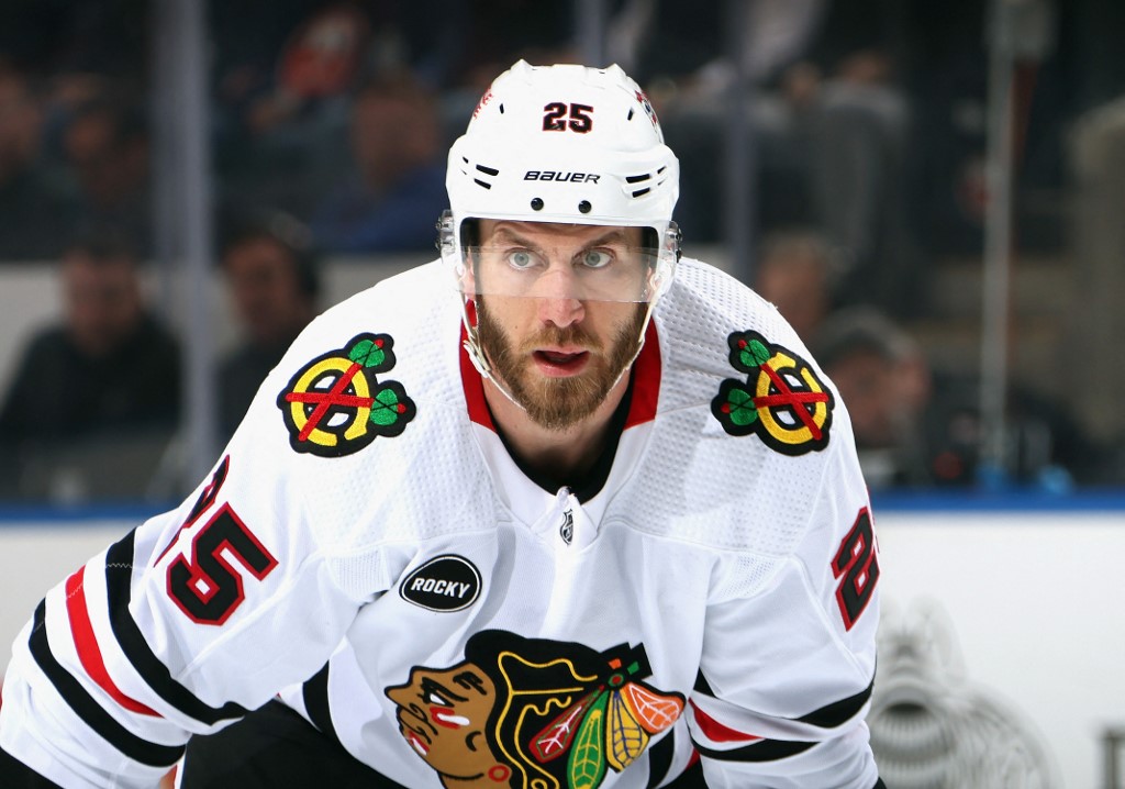 Jarred Tinordi #25 of the Chicago Blackhawks skates as we look at Illinois' sportsbook financials for February 2024.