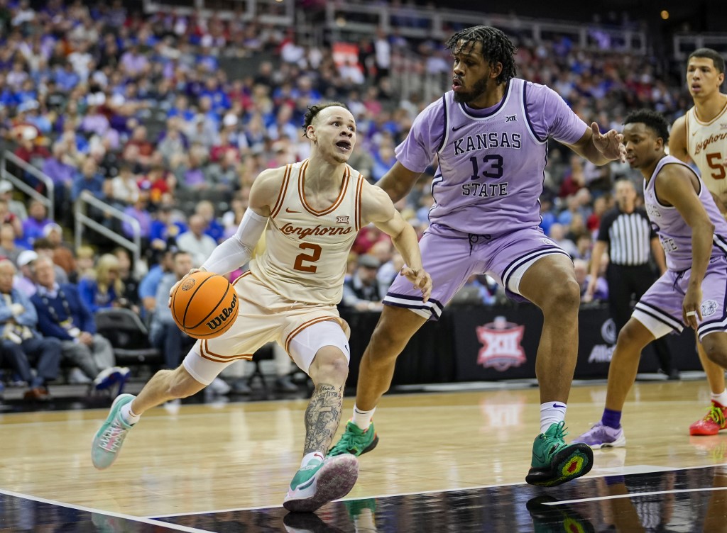 Chendall Weaver #2 of the Texas Longhorns drives baseline against Will McNair Jr. #13 of the Kansas State Wildcats as we make our best Colorado State vs. Texas March Madness prediction.