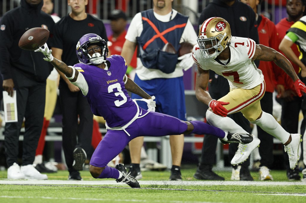 Jordan Addison of the Minnesota Vikings tries to make a catch against the San Francisco 49ers, and we offer new U.S. bettors our exclusive BetMGM bonus code.