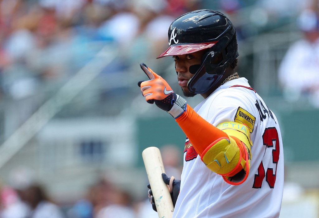 Ronald Acuna Jr. of the Atlanta Braves reacts to the Chicago White Sox dugout as we look at the latest 2024 MLB stolen base leader odds.