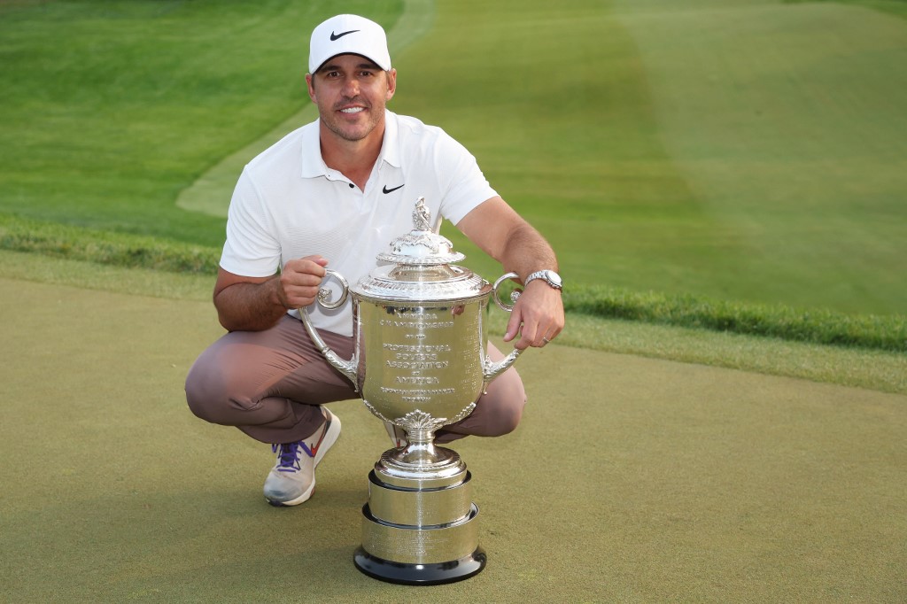 Brooks Koepka celebrates with the Wanamaker Trophy after winning the 2023 PGA Championship as we look the sponsorship deal between ESPN BET and the PGA Championship