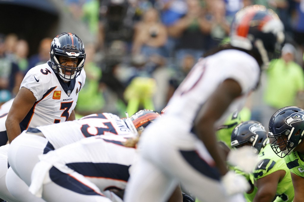 Russell Wilson of the Denver Broncos in action during the first quarter against the Seattle Seahawks. Photo by Steph Chambers/Getty Images via AFP.
