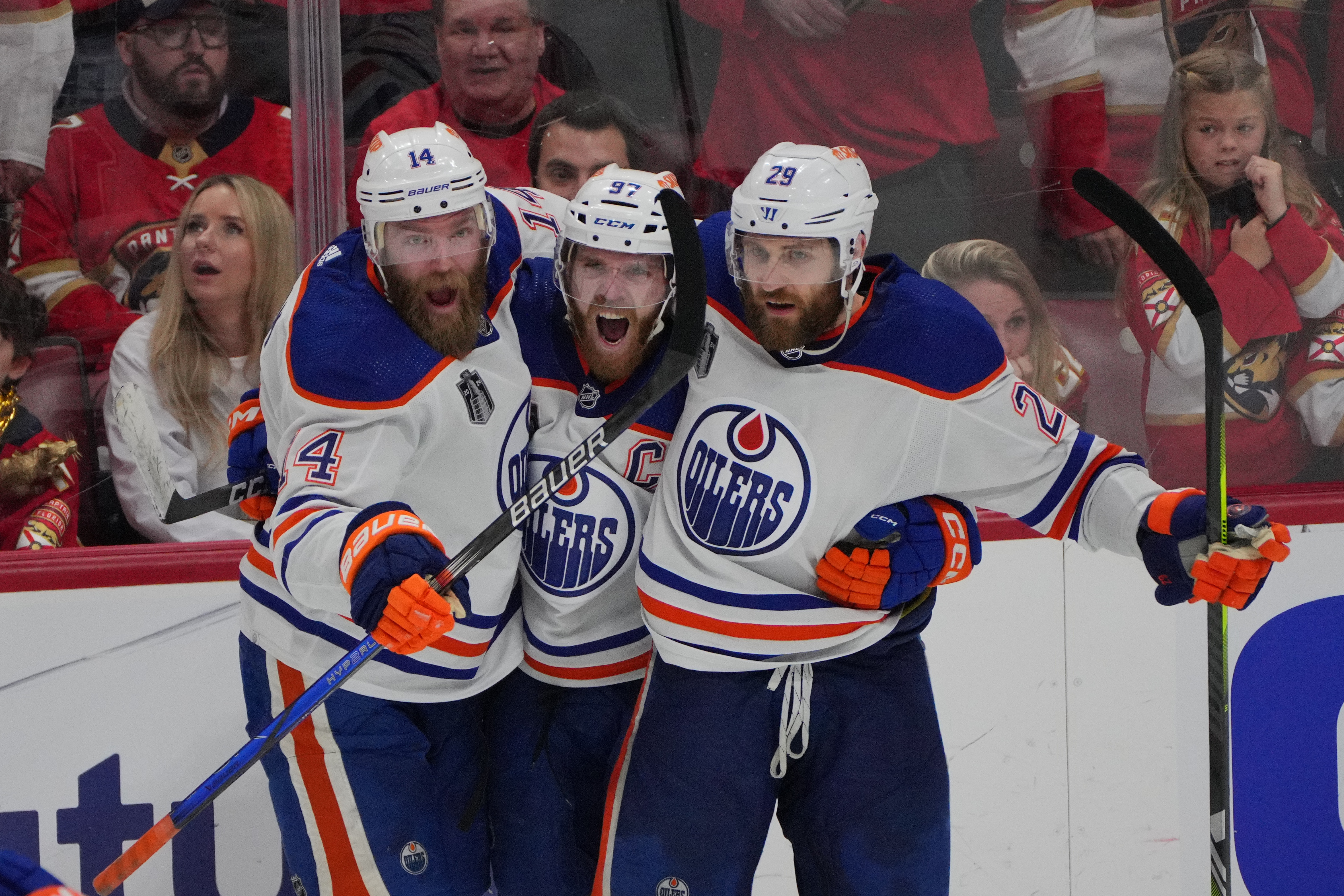 Edmonton Oilers forward Connor McDavid celebrates scoring an empty net goal with defenseman Mattias Ekholm and forward Adam Henrique as Gonzales Oona offers his best Game 6 Stanley Cup Final prediction. 