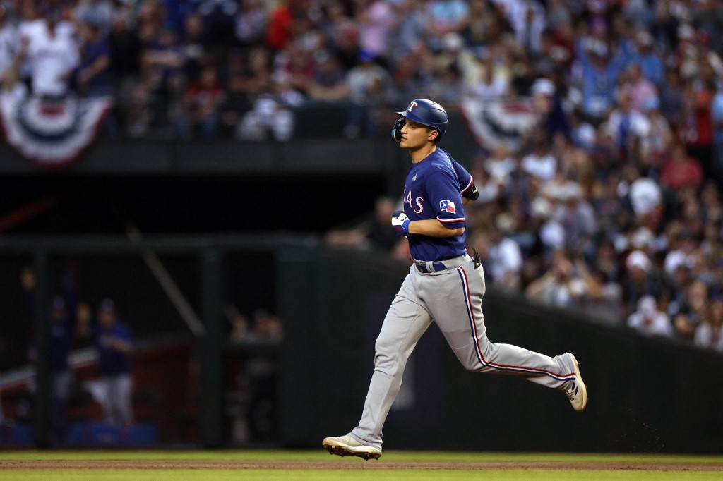 Corey Seager of the Texas Rangers rounds the bases after hitting a home run in the third inning against the Arizona Diamondbacks, and we offer our top World Series MVP predictions based on the best MLB odds.