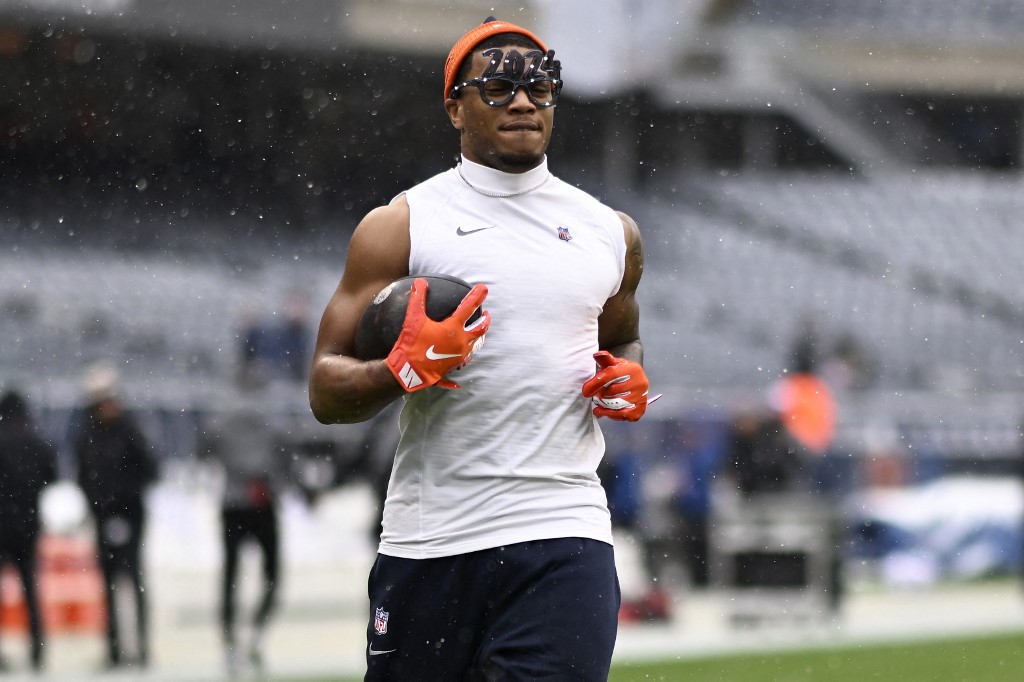 DJ Moore #2 of the Chicago Bears warms-up prior to a game as we look at Illinois' sportsbook financials for January 2024
