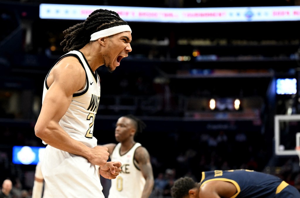 Hunter Sallis #23 of the Wake Forest Demon Deacons celebrates as we look at our bet365 North Carolina bonus code