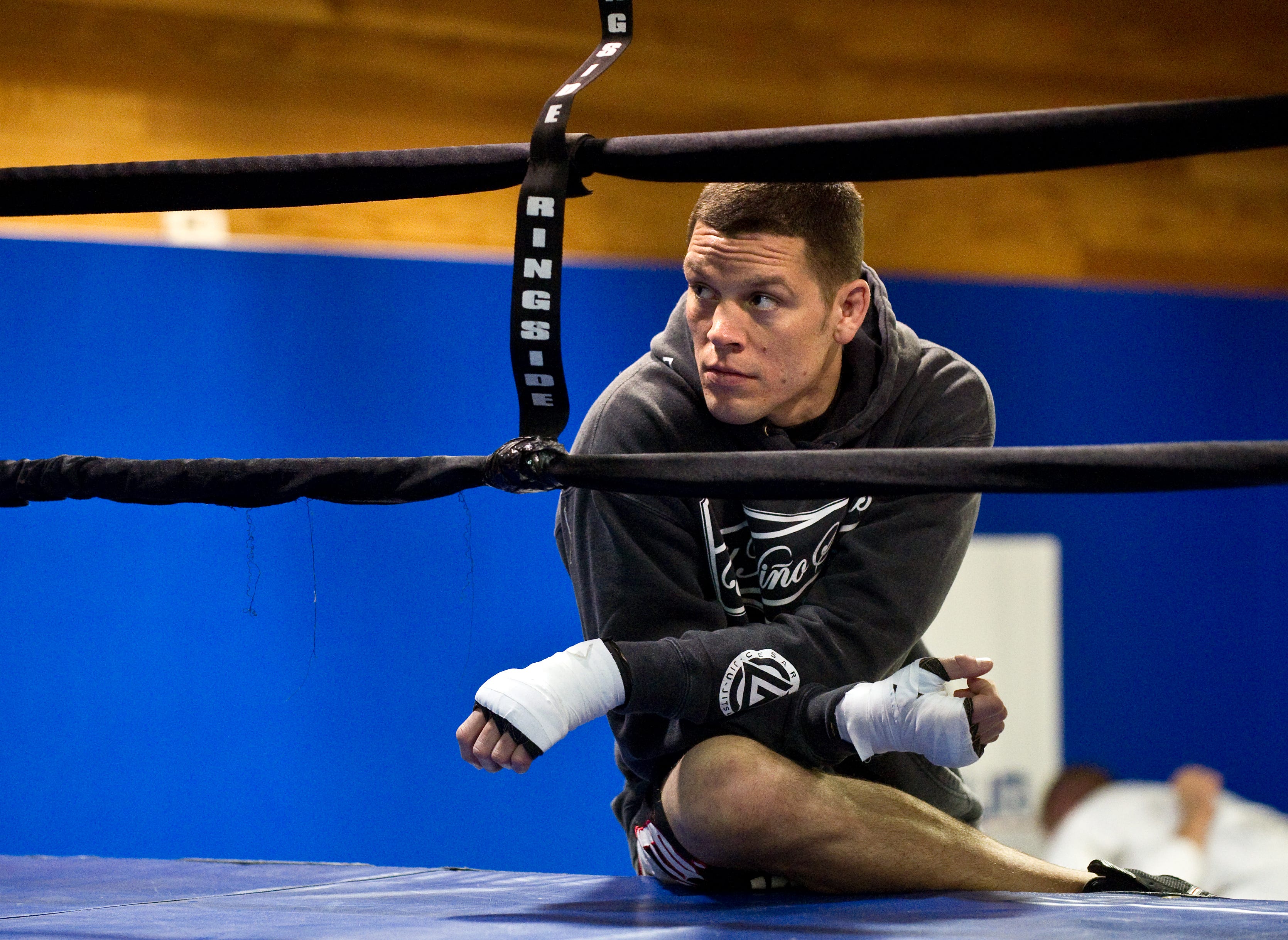 Nate Diaz watches his brother as we look at our best predictions for Diaz vs. Masvidal on July 6, 2024.