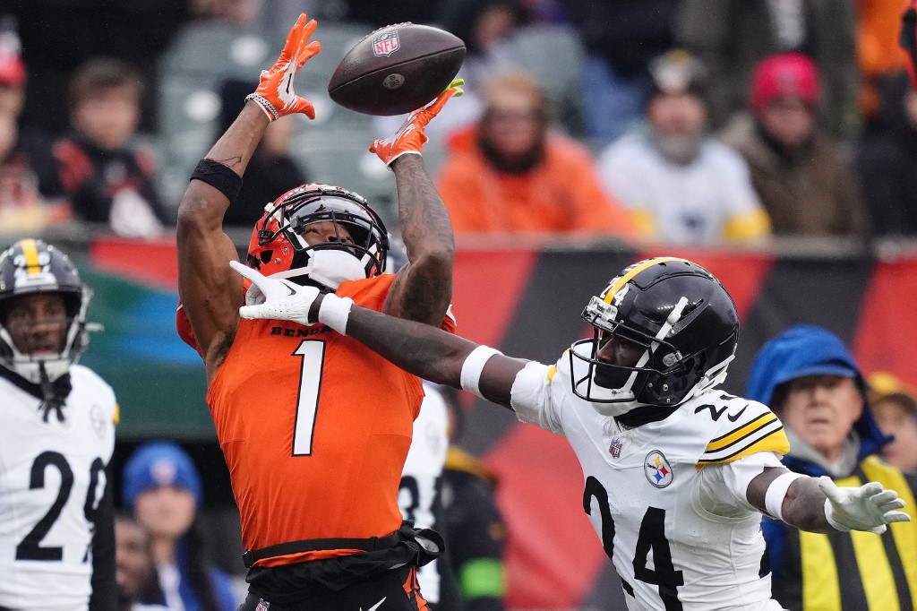 Ja'Marr Chase #1 of the Cincinnati Bengals catches a pass as we make our best Ja'Marr Chase NFL player props for MNF