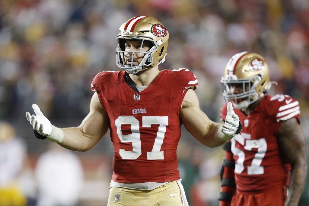 Nick Bosa #97 of the San Francisco 49ers reacts as we make our Super Bowl 2024 expert picks for Chiefs vs. 49ers ahead of Sunday's Big Game at Allegiant Stadium in Las Vegas.