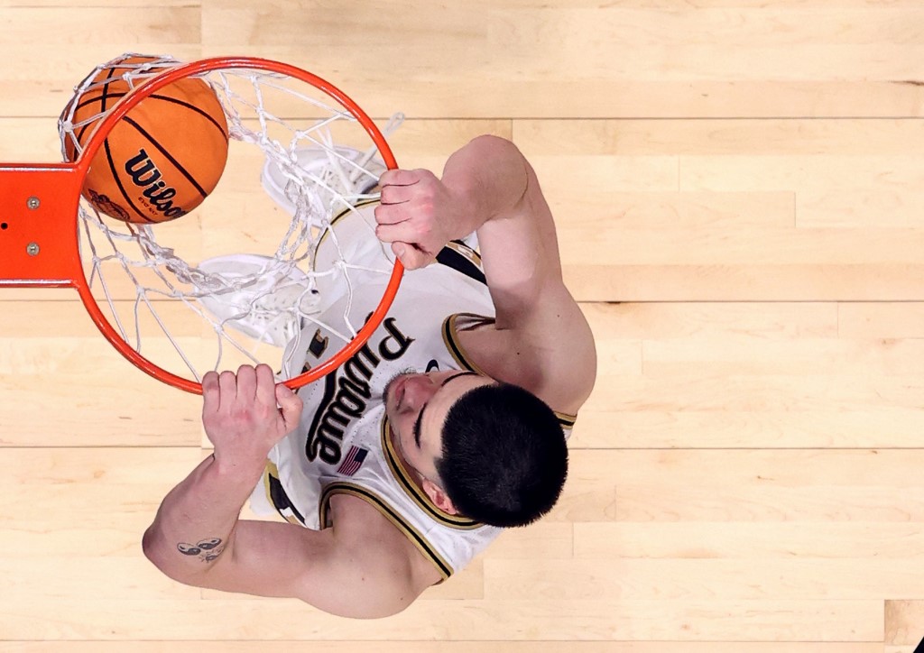 Zach Edey #15 of the Purdue Boilermakers dunks the ball as we look at the best Final Four March Madness odds & lines for the 2024 NCAA Tournament