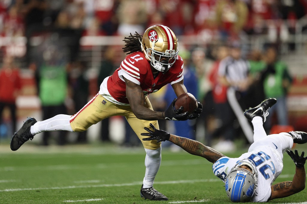 Brandon Aiyuk #11 of the San Francisco 49ers catches a pass as we make our Super Bowl 2024 longest plays props predictions for Chiefs vs. 49ers on Feb. 11 at Allegiant Stadium in Las Vegas.