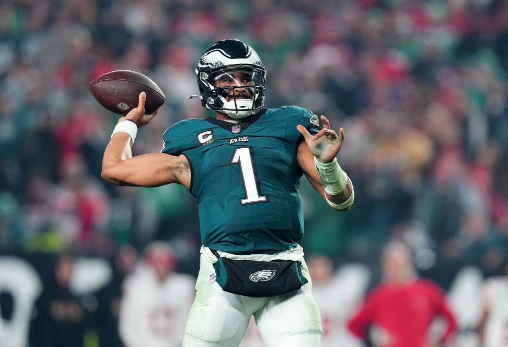 Jalen Hurts of the Philadelphia Eagles passes the ball as we share our best Jalen Hurts player props for Week 15.