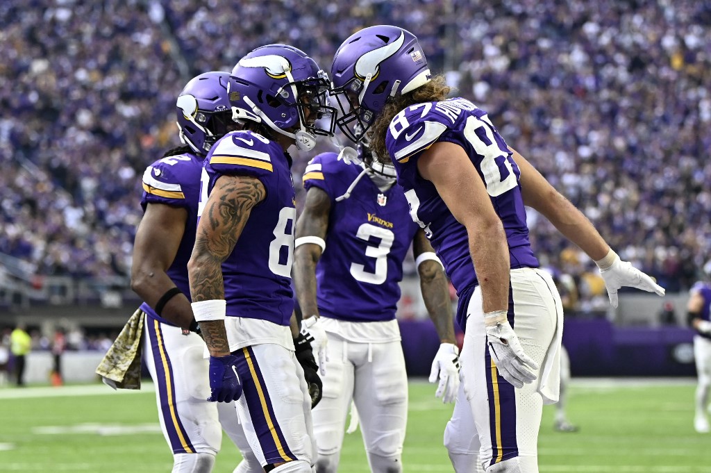 T.J. Hockenson of the Minnesota Vikings celebrates after scoring a touchdown as we look at the latest regarding sports betting in Minnesota.