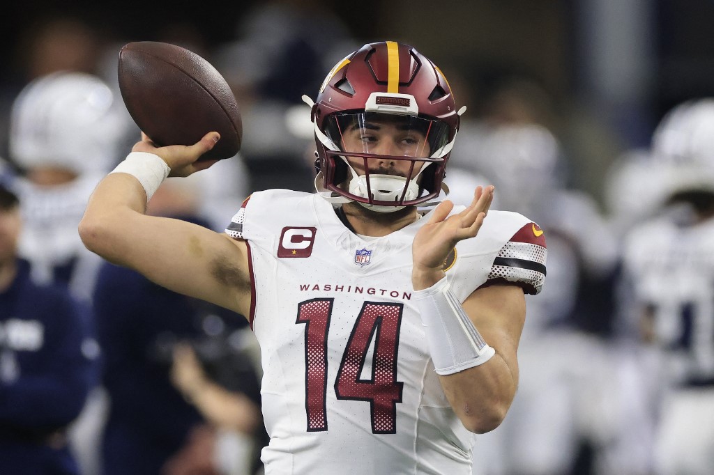 Sam Howell of the Washington Commanders warms up prior to the game against the Dallas Cowboys as we look at our NFL upset picks for Week 13.