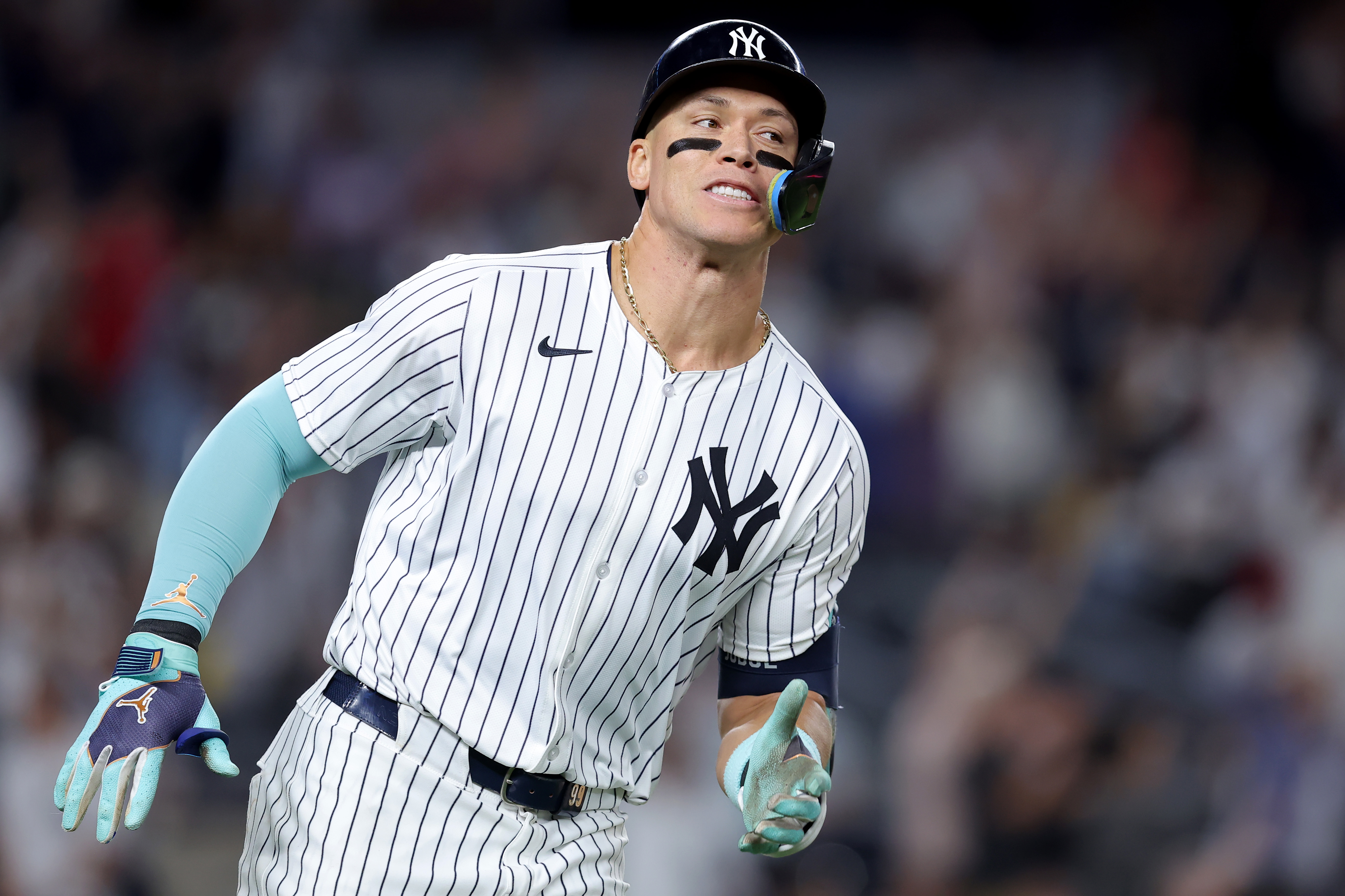 New York Yankees designated hitter Aaron Judge rounds the bases after hitting a solo home run against the Cincinnati Reds during the seventh inning at Yankee Stadium. We're backing Judge in our Red Sox vs. Yankees Player Props.