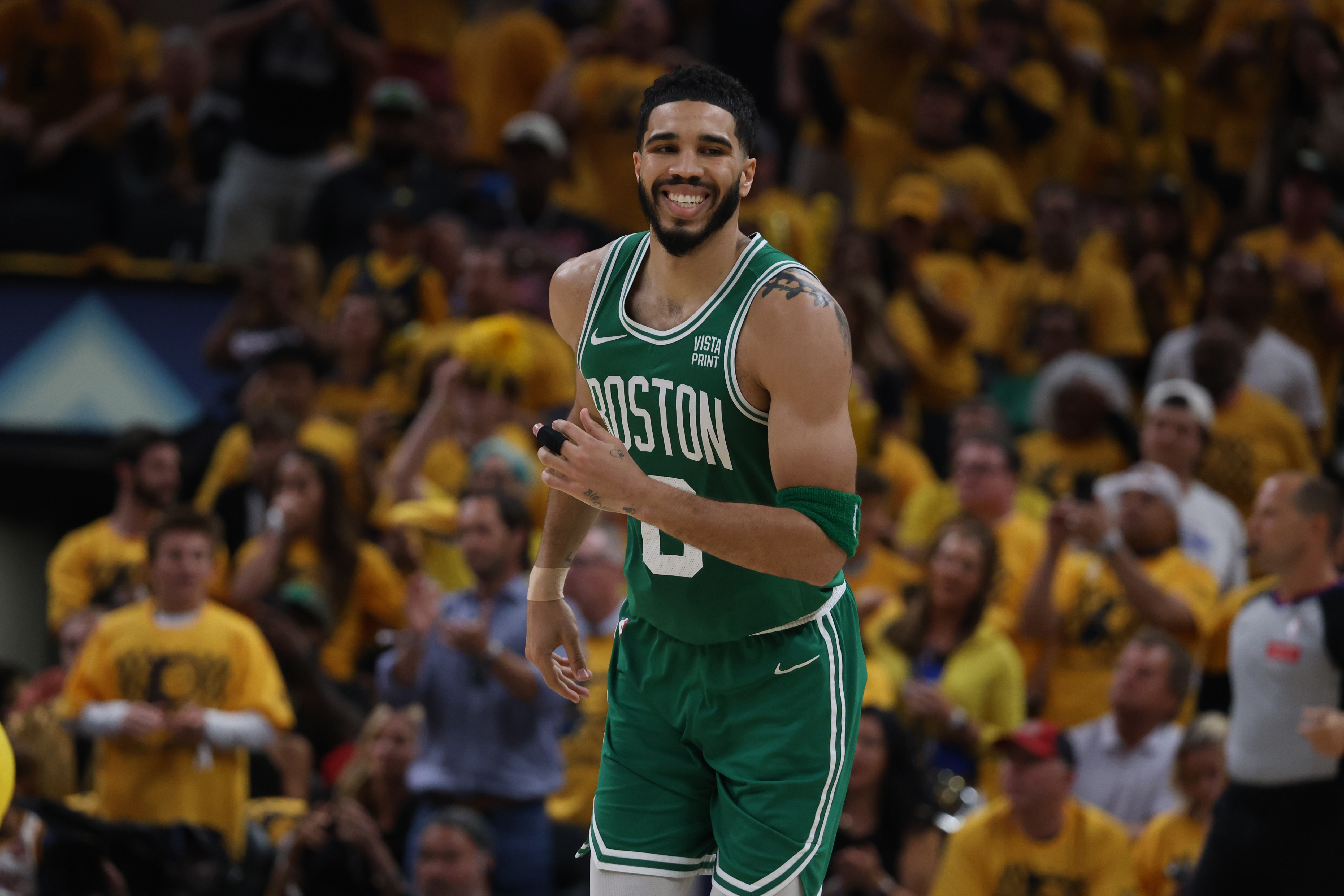 Boston Celtics forward Jayson Tatum reacts after a basket against the Indiana Pacers during the second quarter of Game 3 of the Eastern Conference finals in the 2024 NBA playoffs at Gainbridge Fieldhouse as we look at our Jayson Tatum player props.