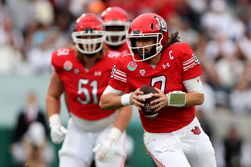 Cameron Rising of the Utah Utes scrambles against the Penn State Nittany Lions during the second quarter in the 2023 Rose Bowl. Utah is the favorite by the 2024 Big 12 Championship Odds.