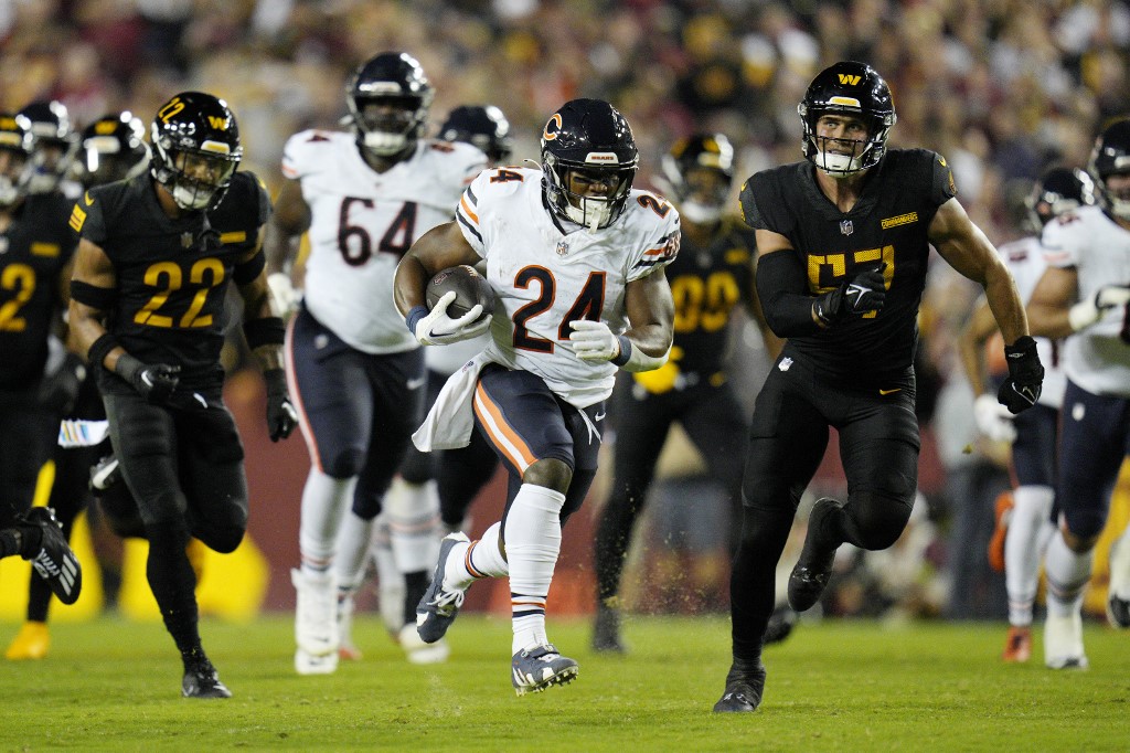 Khalil Herbert #24 of the Chicago Bears runs with the ball as we look at our anytime touchdown scorer predictions for Week 16