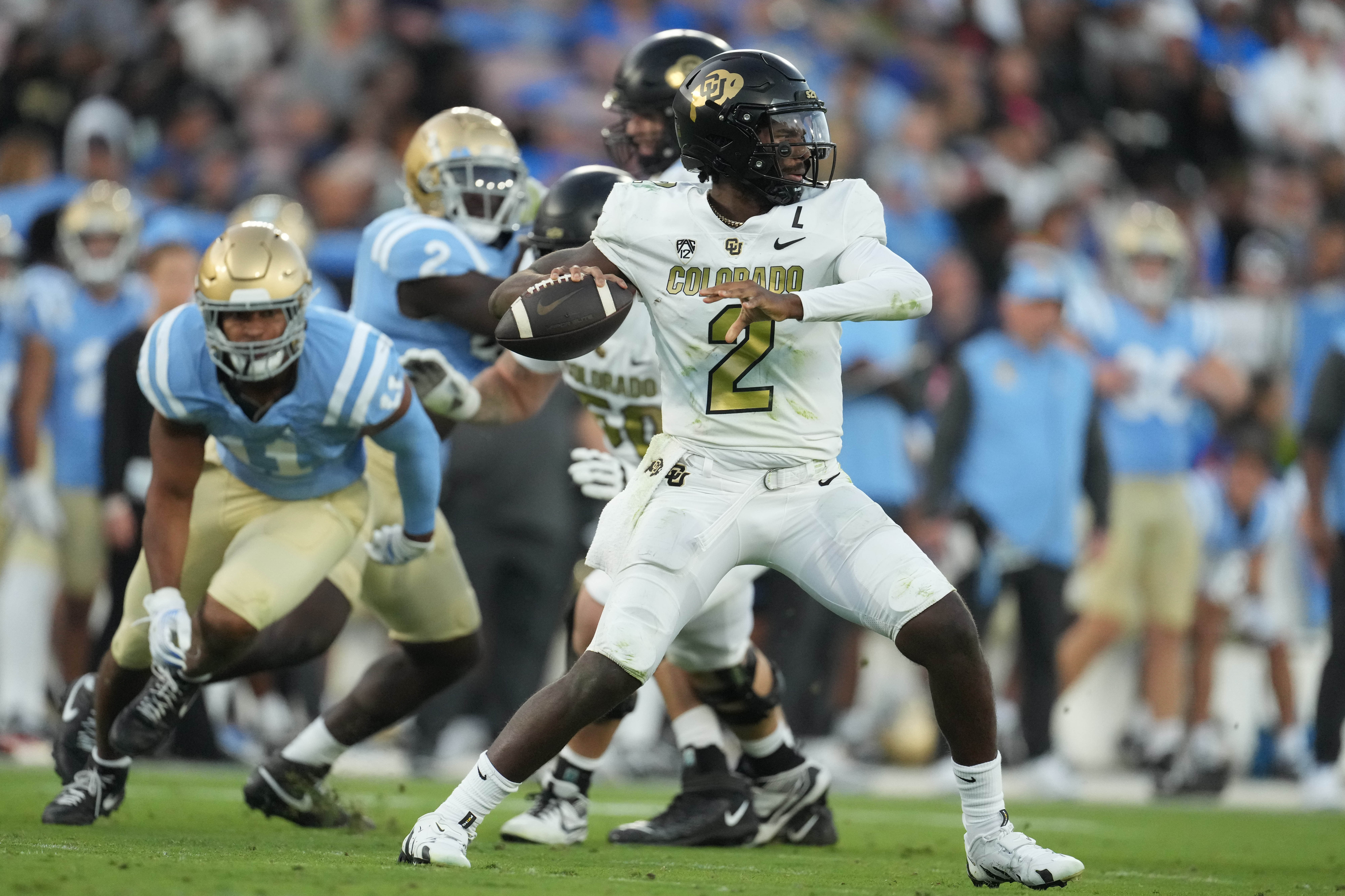 Colorado Buffaloes quarterback Shedeur Sanders throws the ball against the UCLA Bruins in the first half at Rose Bowl. Sanders is the favorite to go No. 1 by the 2025 NFL Draft Odds.
