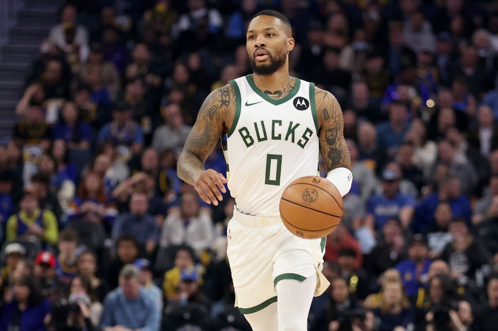 Damian Lillard of the Milwaukee Bucks dribbles the ball against the Golden State Warriors at Chase Center as we look at out Bucks-Pelicans NBA player props.