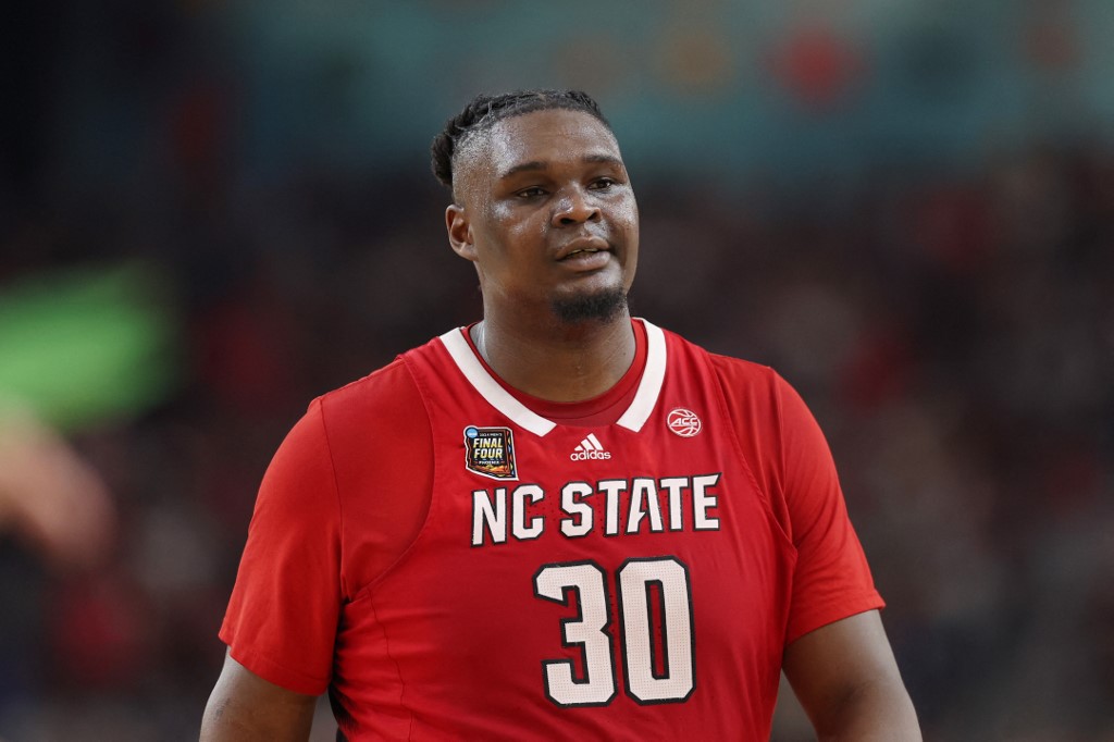 DJ Burns Jr. #30 of the North Carolina State Wolfpack walks across the court as we look at North Carolina's first month of sportsbook action