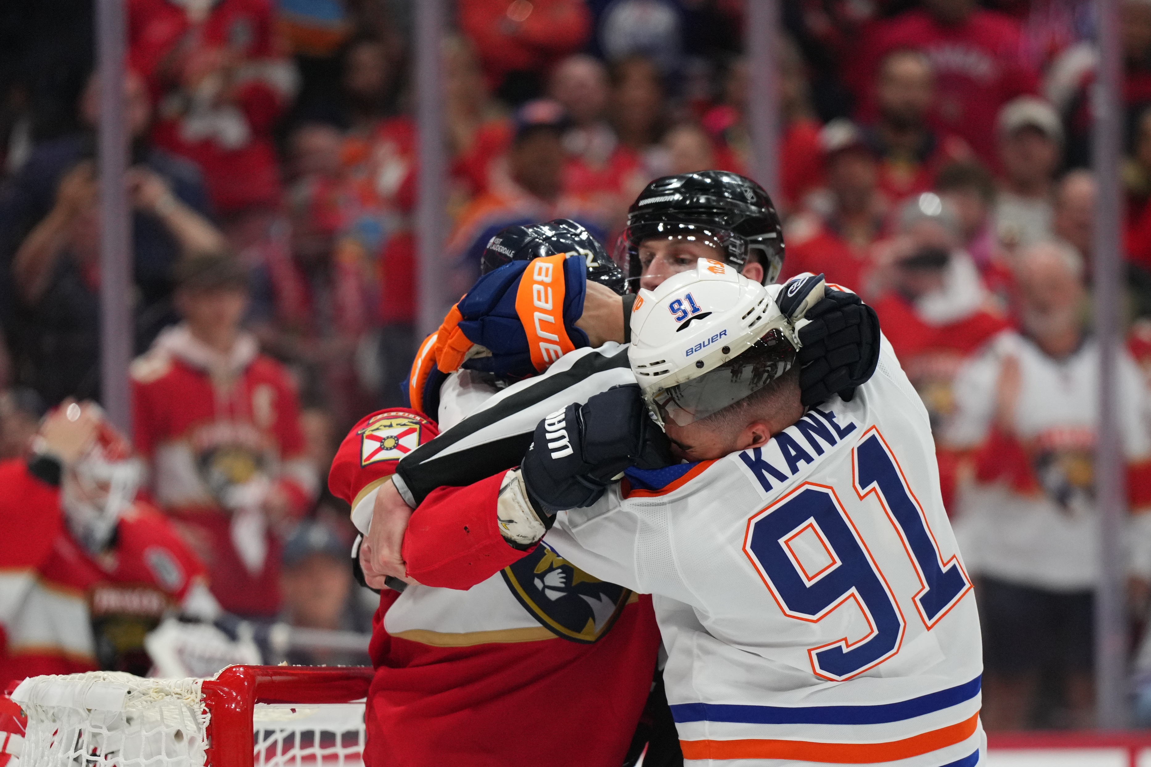 Florida Panthers defenseman Brandon Montour and Edmonton Oilers forward Evander Kane fight as Gonzales Oona offers Game 3 prediction for Thursday's tilt between the Panthers and Oilers.