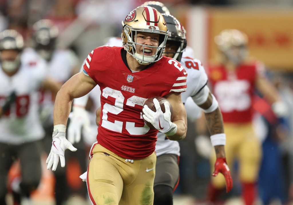 Christian McCaffrey of the San Francisco 49ers runs the ball for a touchdown against the Tampa Bay Buccaneers, and we offer our top Super Bowl rushing props based on the best NFL odds.