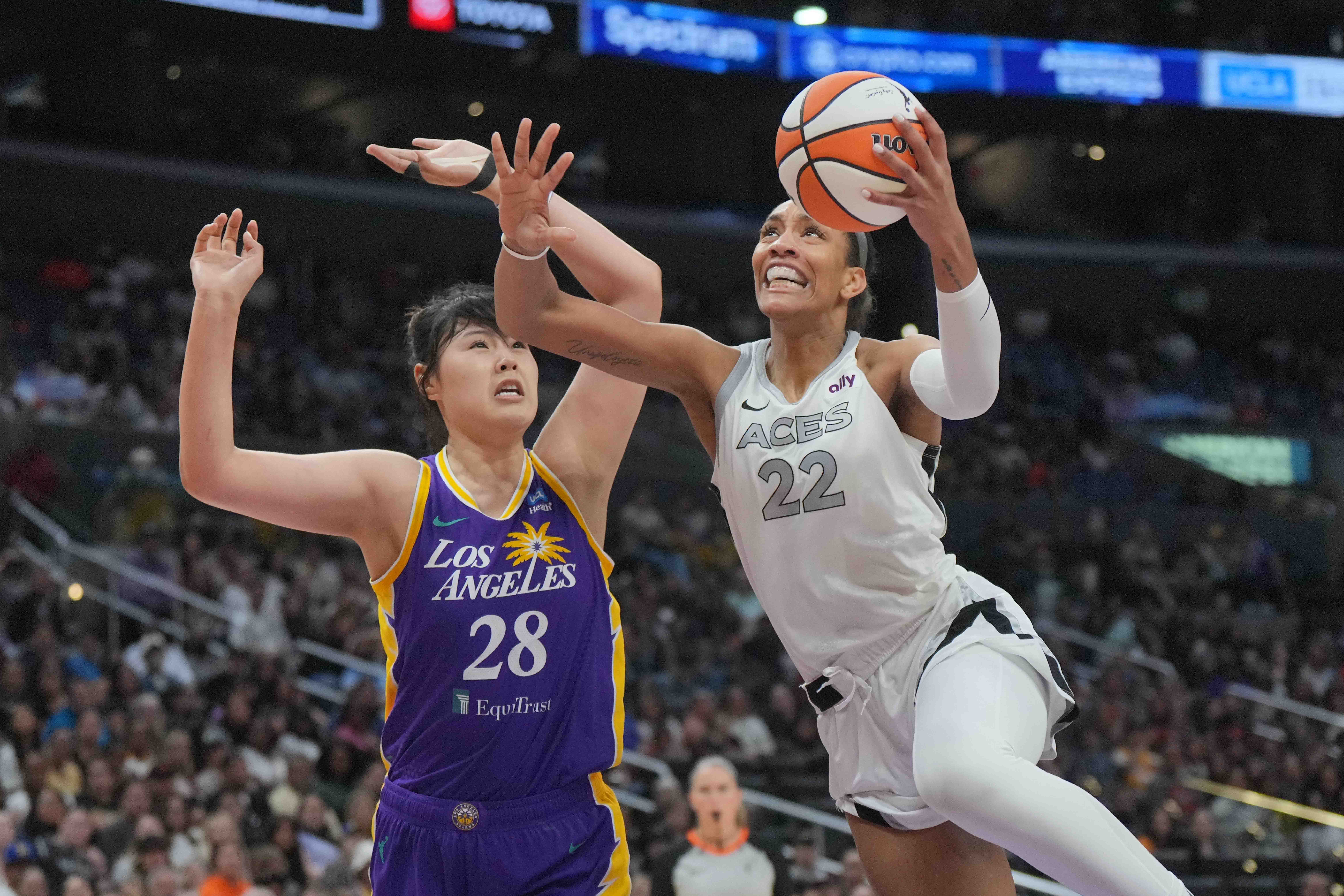 Las Vegas Aces center A'ja Wilson shoots the ball against LA Sparks center Li Yueru in the second half at Crypto.com Arena. We're back the Aces in our Wings vs. Aces Prediction. 