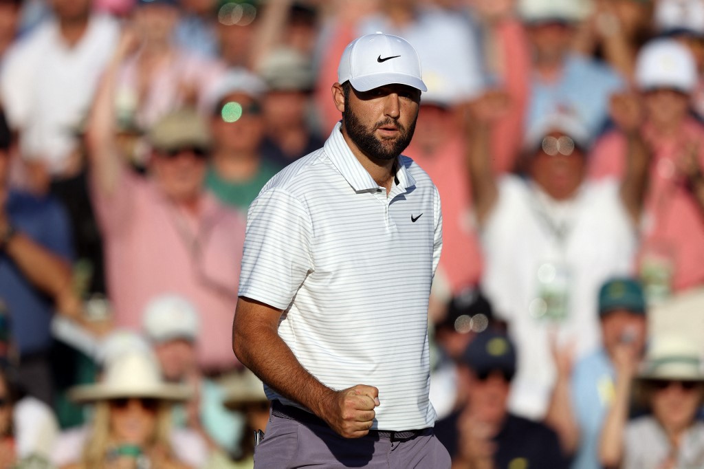 Scottie Scheffler of the United States reacts after making birdie as we look at our Masters Round 4 odds and picks