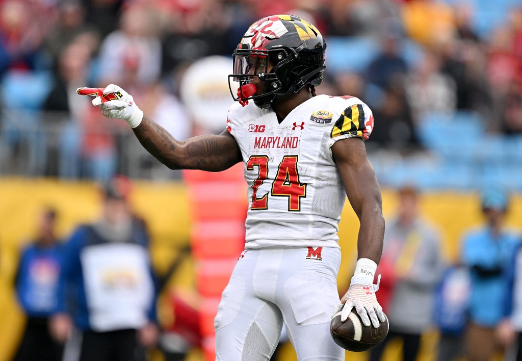 Roman Hemby of the Maryland Terrapins signals as we provide an update on Maryland's legal sports betting handle and revenue from October 2023.