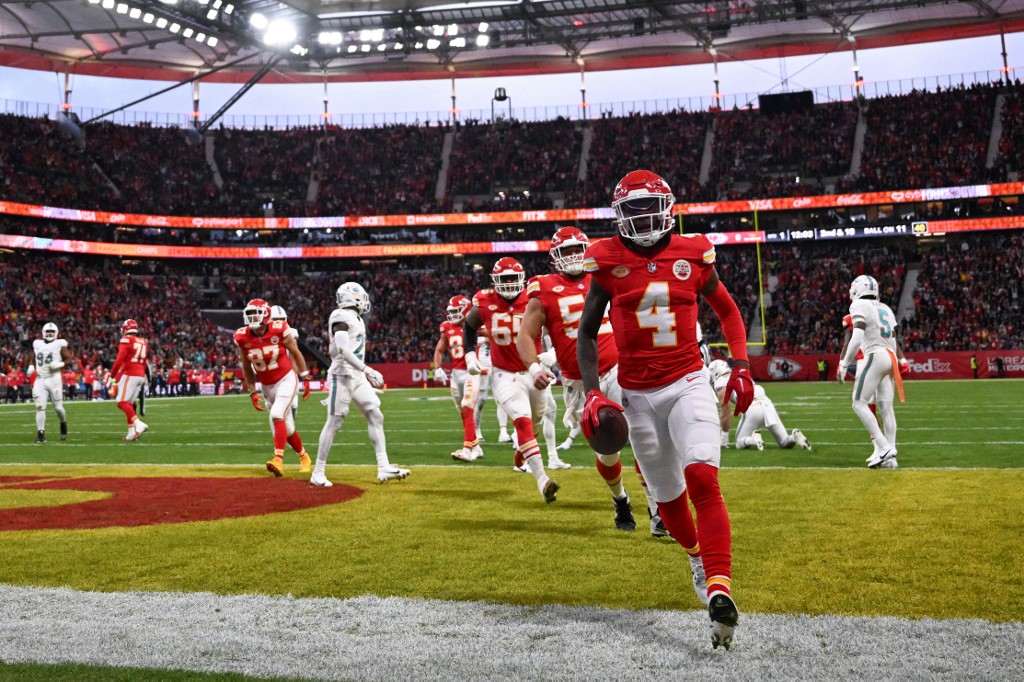 Kansas City Chiefs wide receiver Rashee Rice (R) celebrates a touchdown as we offer our anytime touchdown scorer predictions