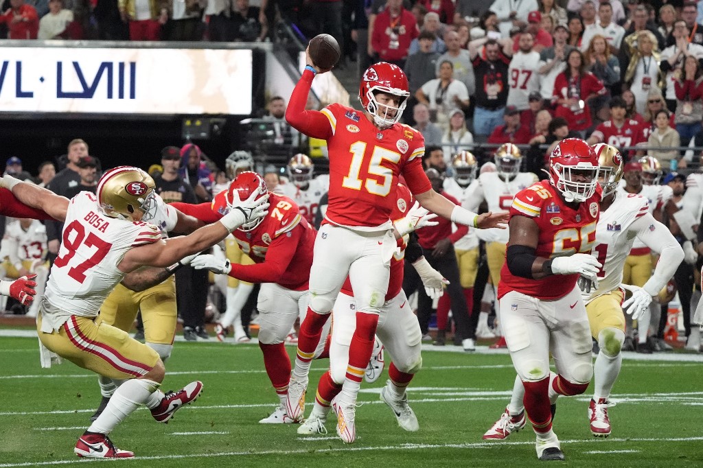 Kansas City Chiefs quarterback Patrick Mahomes passes the ball during Super Bowl LVIII against the San Francisco 49ers. The Chiefs lead the 2024-25 NFL Playoff Odds.