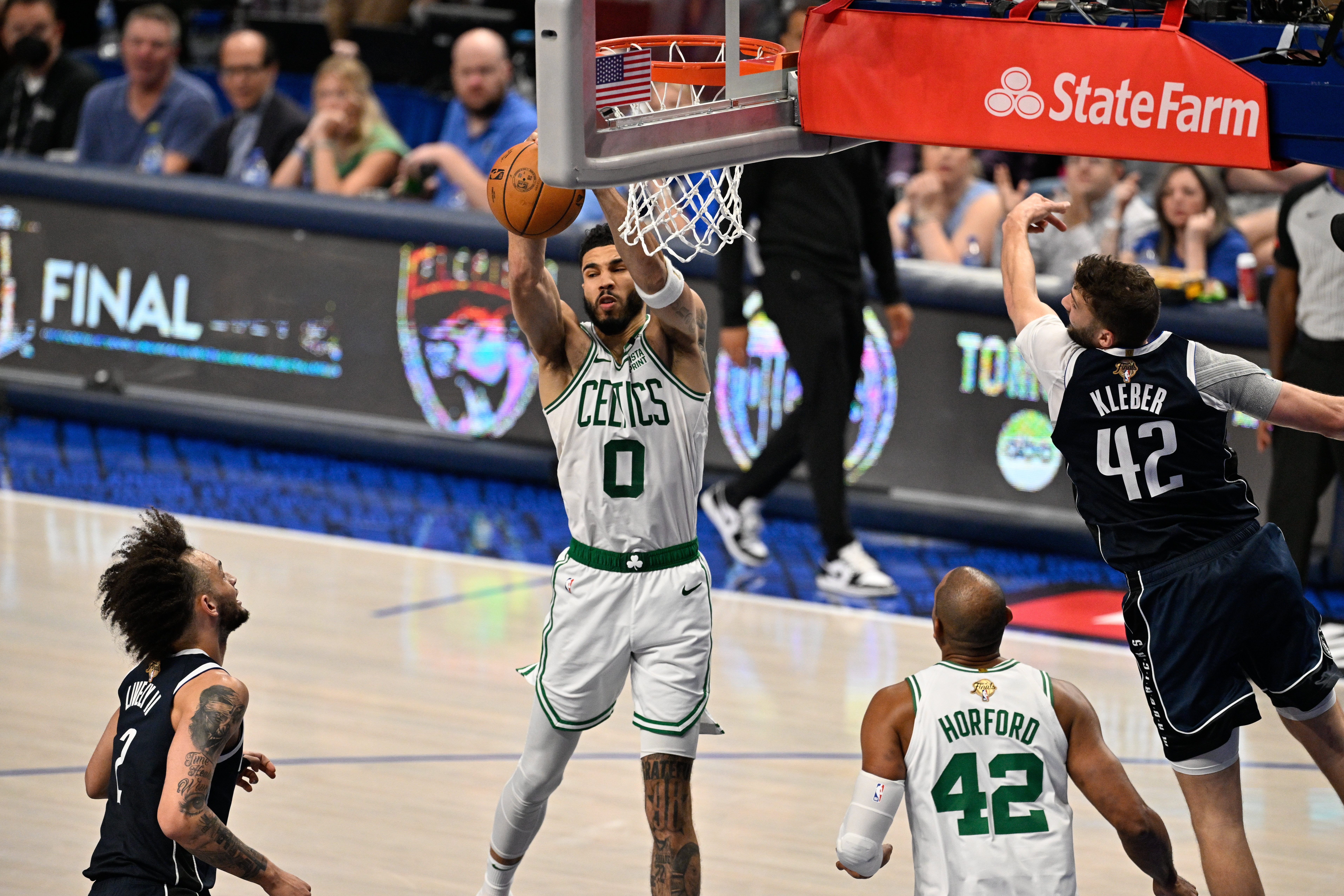 Boston Celtics forward Jayson Tatum rebounds the ball as we look at our top Jayson Tatum odds and player props
