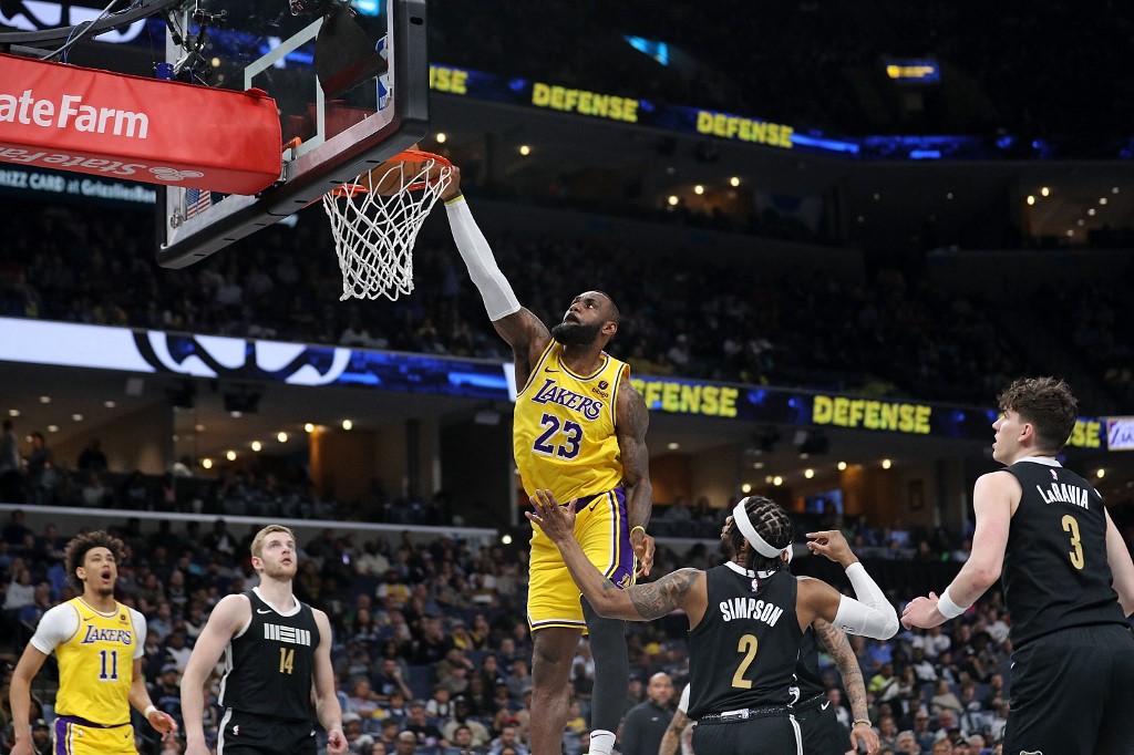 LeBron James #23 of the Los Angeles Lakers goes to the basket as we look at our Lakers vs. Pelicans player props