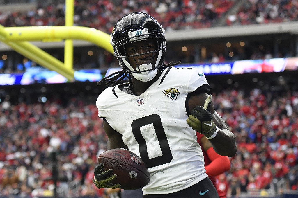 Calvin Ridley of the Jacksonville Jaguars reacts after scoring as we share our top Ravens vs. Jaguars bonus code.