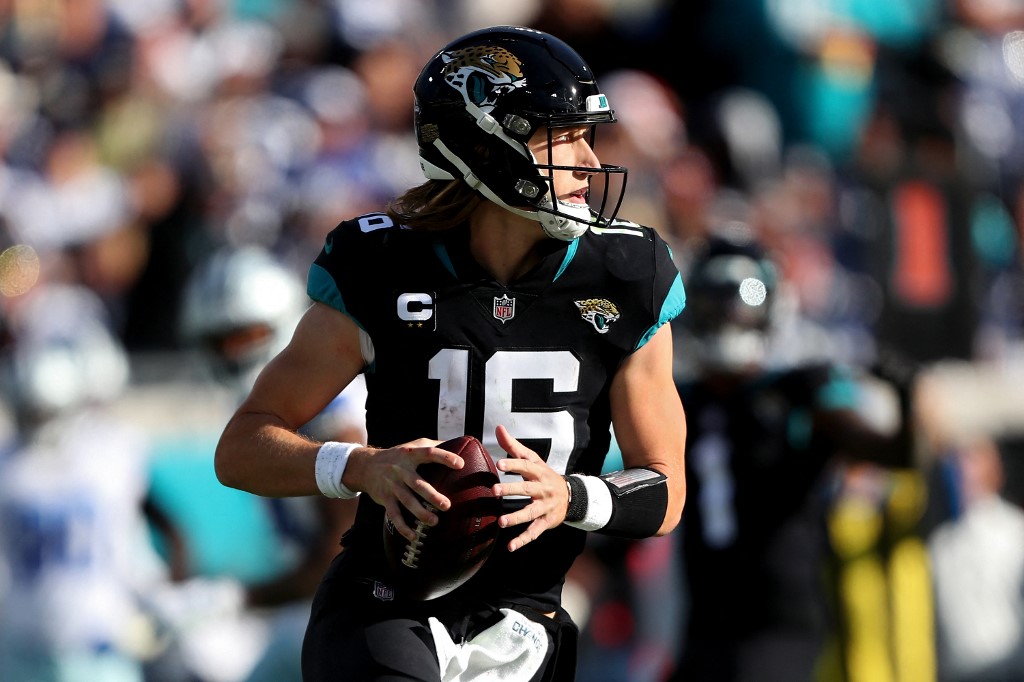 Trevor Lawrence of the Jacksonville Jaguars looks to pass against the Dallas Cowboys.