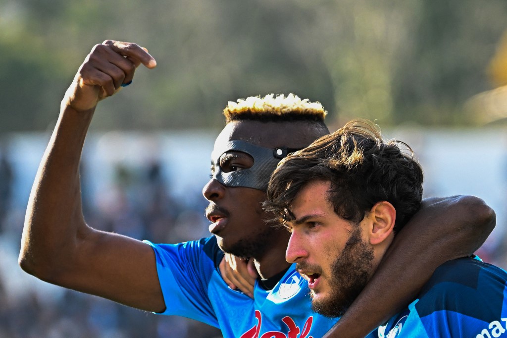 Napoli's Nigerian forward Victor Osimhen celebrates with Napoli's Georgian forward Khvicha Kvaratskhelia. We're backing Napoli in our soccer best bets for February 10-13.
